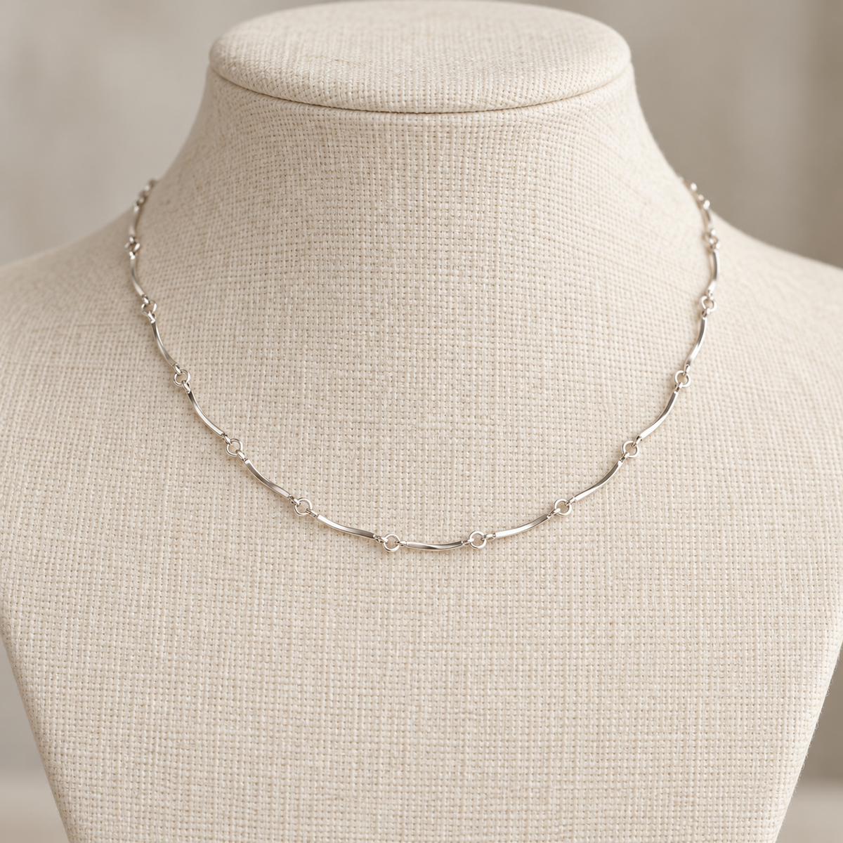 Sterling silver curved bones necklace