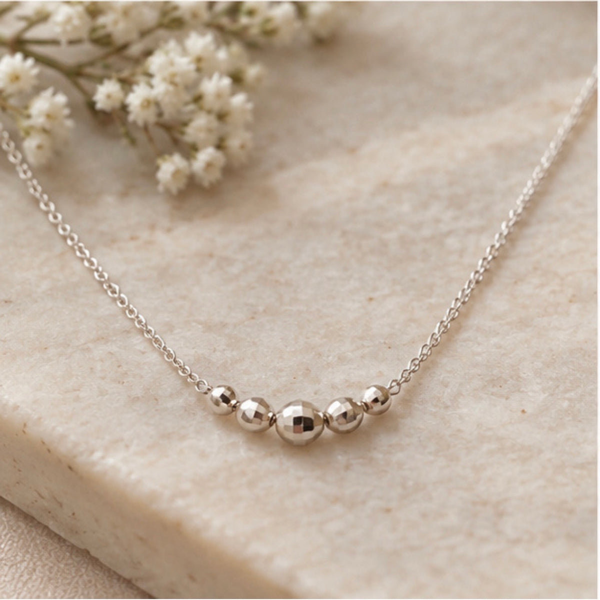 Sterling Silver Graduated Disco Bead Necklace